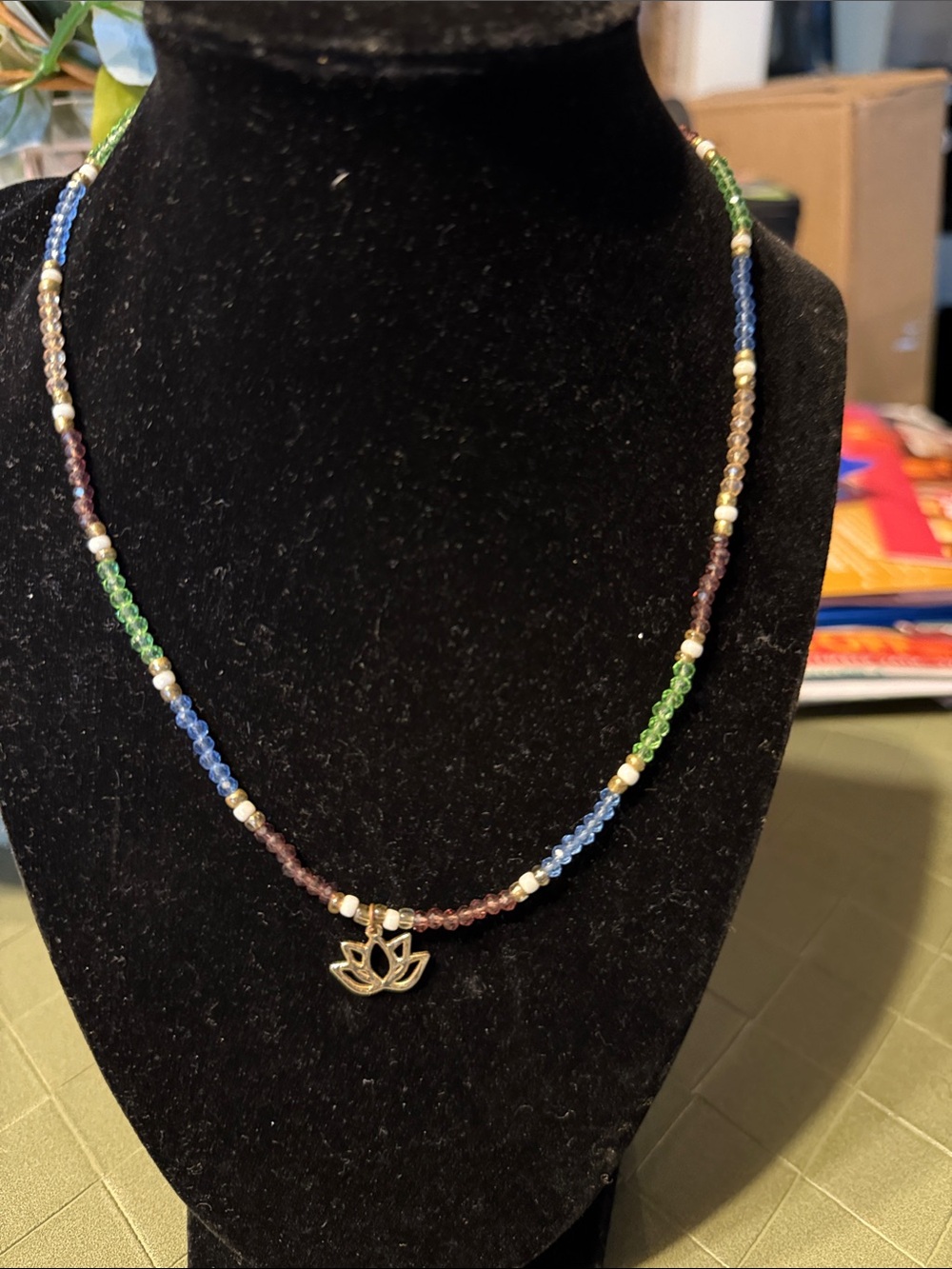 Gold Lotus Pendant Beaded Necklace in Blue, Green, Brown